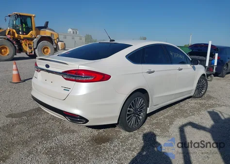 2017 Ford Fusion Titanium z USA, uszkodzony, nr VIN 3FA6P0K99HR231577